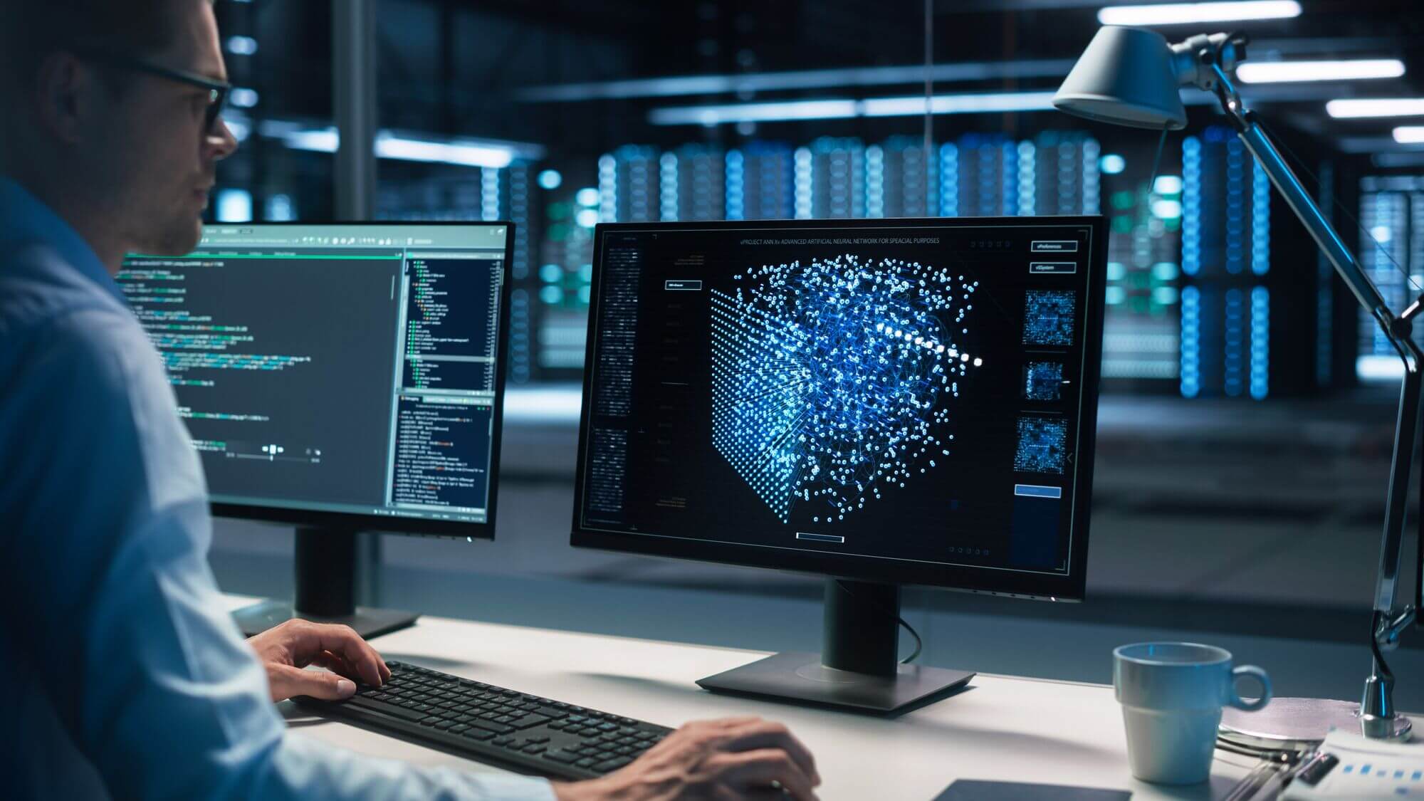 Battery diagnostics engineer analysing EV cell-level data on multiple screens in a data centre